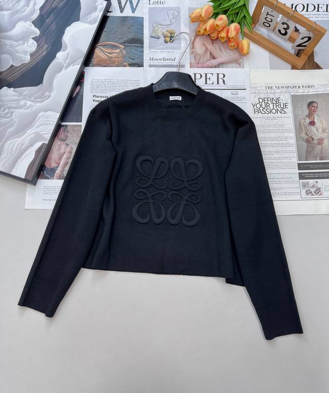 Loewe's wool embossed Anagram pullover sweater is both sophisticated and relaxed