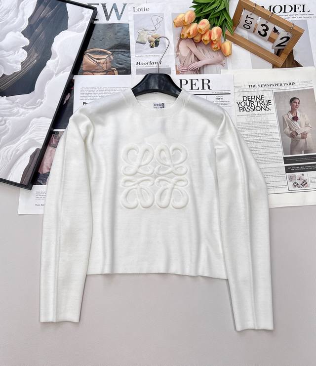 Loewe's wool embossed Anagram pullover sweater is both sophisticated and relaxed