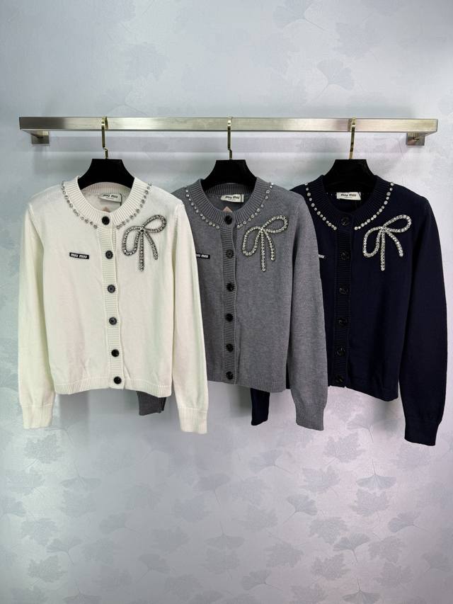 Miu*25 Early Fall new bow-knit cardigan. Exquisite hand-beaded bow design with b