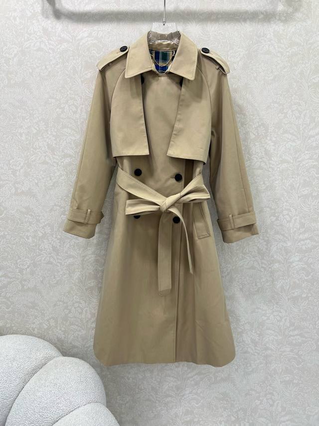 Ysl 25 Early Fall mid-length trench coat. This double-breasted, British-inspired