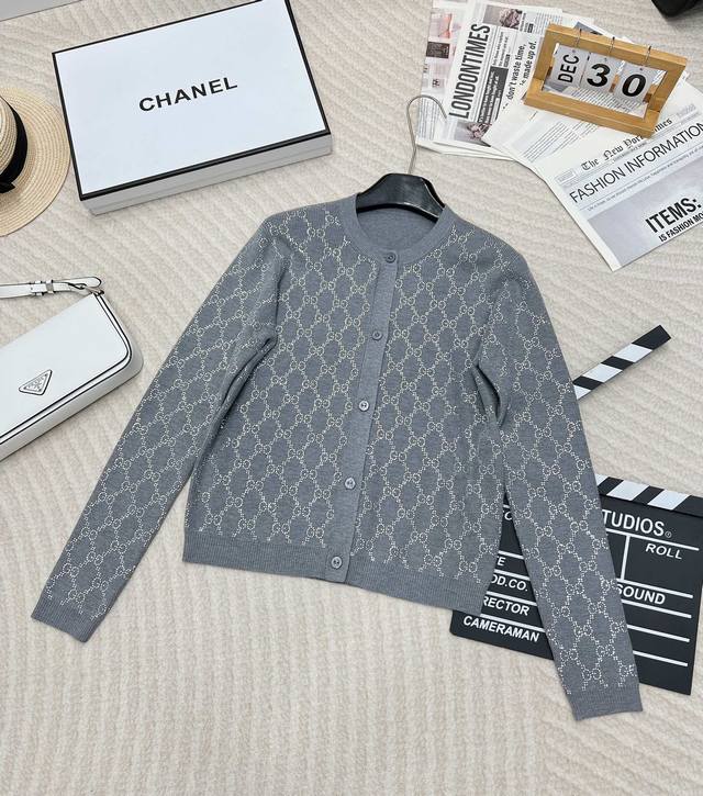 Gucci's new crystal-embellished wool cardigan, crafted from gray ultra-fine wool