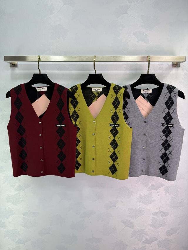 Miu*25's new early fall quilted vest features a V-neck design with a preppy vibe