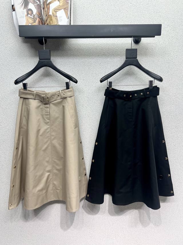 A Monk's A-line side-snaps skirt is a soft, delicate, and classic, youthful piec