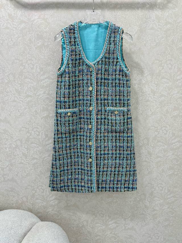 Chan*L's woolen, tied-hem dress and vest are now shipping in high-volume quantit