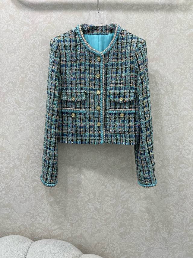 Chan*L25's new woolen, tied-hem dress jacket is now shipping in its high-volume