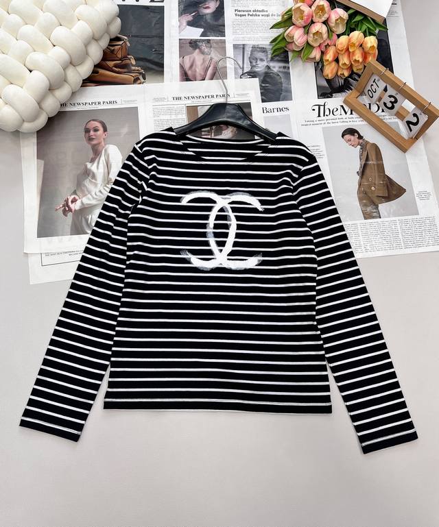 Chanel's new loose-fitting striped long-sleeved top for 2025 is made from custom