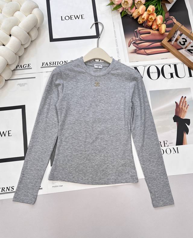 Chanel's new early fall collection, hand-sewn diamond-embellished logo round-nec