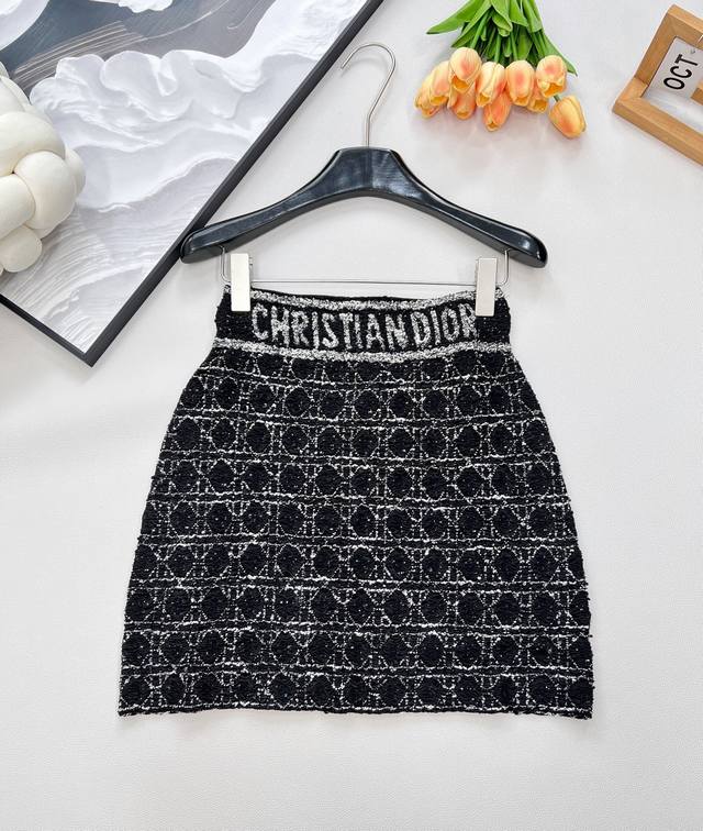 Dior's cannage-patterned, heavy-worked, chunky knit jacket and skirt set. The ca