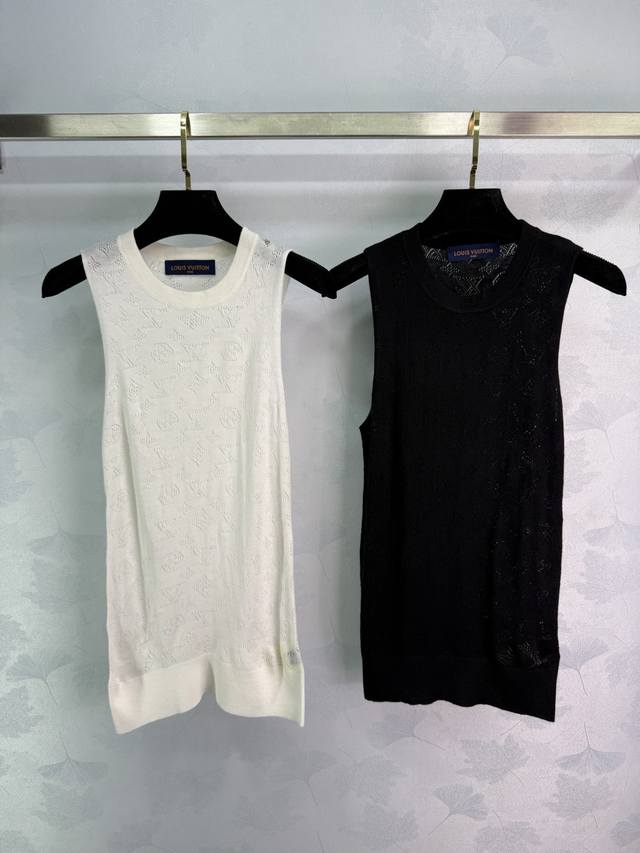Lou*25's new early fall hollow knit crew neck vest is breathable, soft, and skin