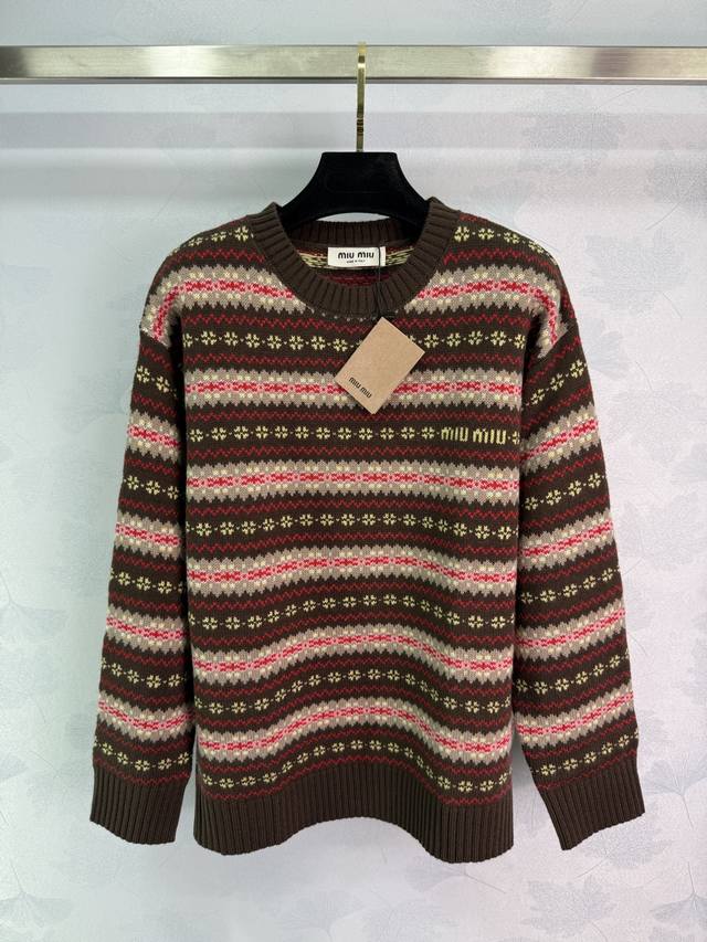 Miu*'s new Autumn/Winter 2025 Fair Isle sweater features a brown base with red s