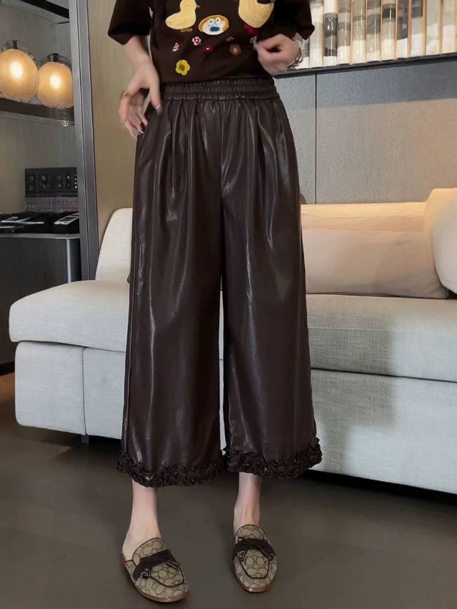 100% protein leather lace straight-leg pants with a premium texture and smooth