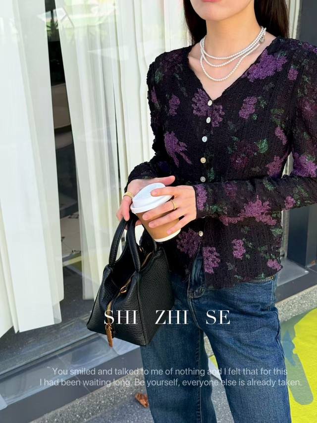 A vintage wisteria pleated blouse, featuring a deep base stained with purple bl