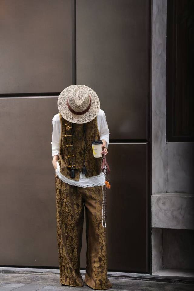 Luxury light Chinese silk gourd suit. The oriental brown jacquard fabric is deli
