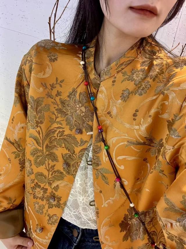 Highly recommend this hot-selling Chinese-style jacket. The bright yellow satin