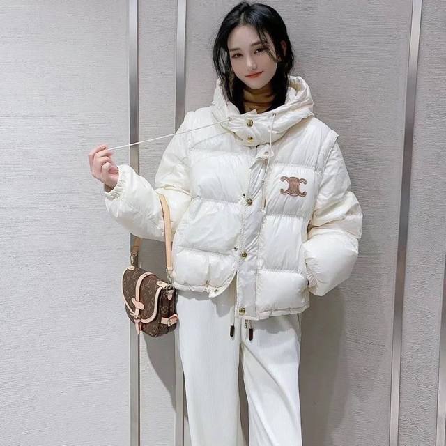 Ce Arc de Triomphe long-sleeved down jacket with detachable sleeves. Two-way wea