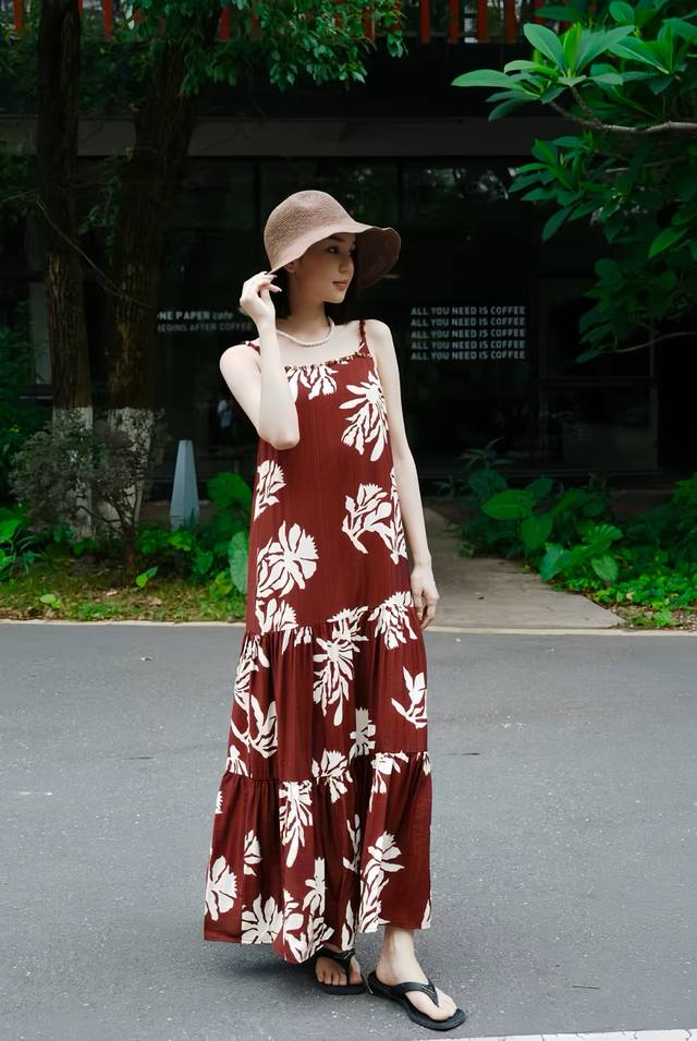 Best hit: High-end, elegant, and refined suspender dress with a tiered skirt tha