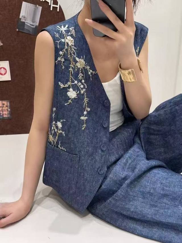 High-quality, heavily beaded, and beautiful denim vest. Dyed in classic cow blue