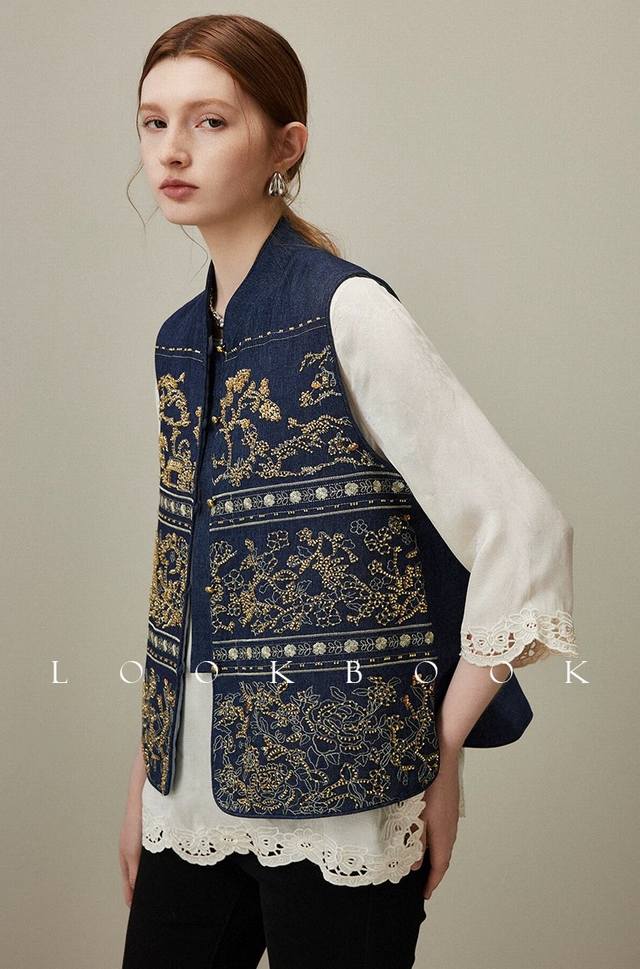 Heavy beaded embroidered denim vest, the color combination is harmonious and liv