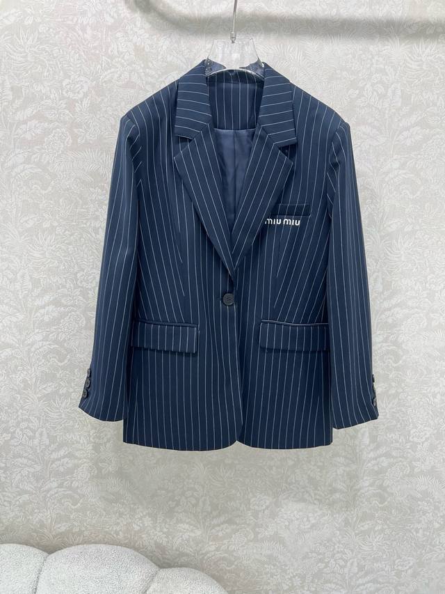Miumi* 25's new striped blazer features the ever-popular Miu line, a vintage-ins