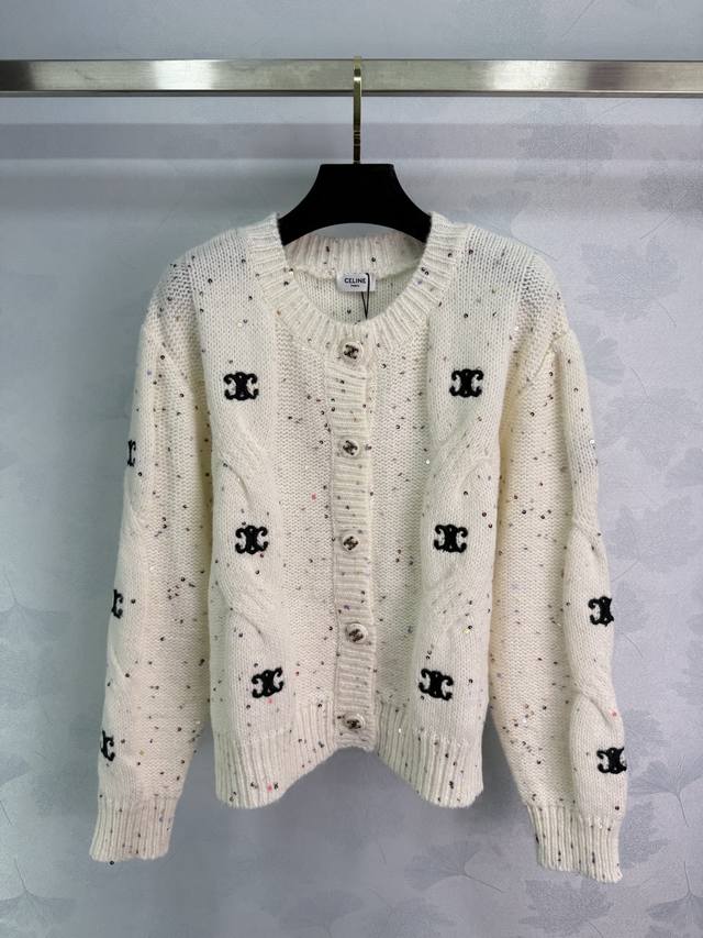 Ce*25 New Early Fall Knit Cardigan in creamy white with all-over sequined letter