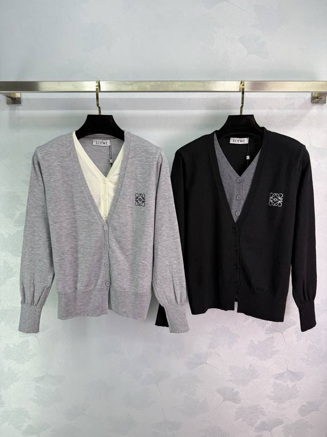 Loe*25's new early fall V-neck knit cardigan features classic logo embroidery on