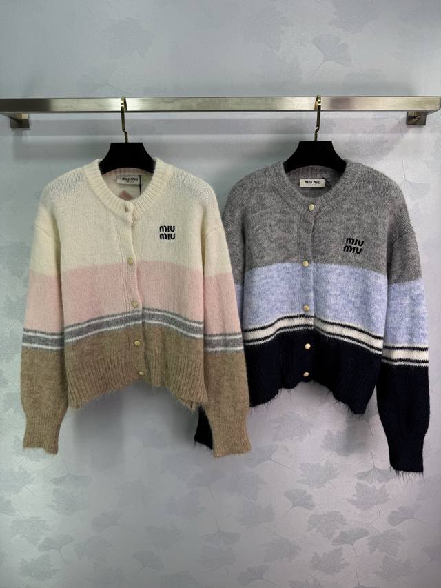 Miu*25's new early fall striped knit cardigan features a small logo embroidered