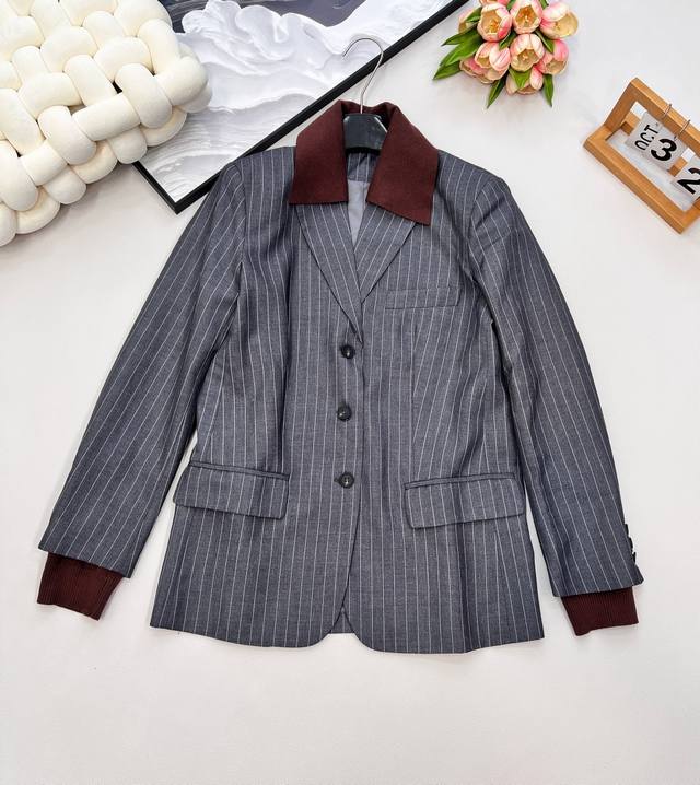 Miumiu's stylish, preppy-chic, chest-pocket blazer. A laid-back, French-inspired