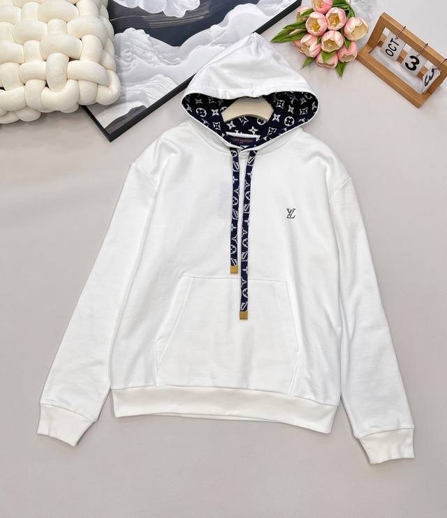 Louis Vuitton Ski Collection Ribbon and Cord Print Hoodie. This cotton hoodie fe
