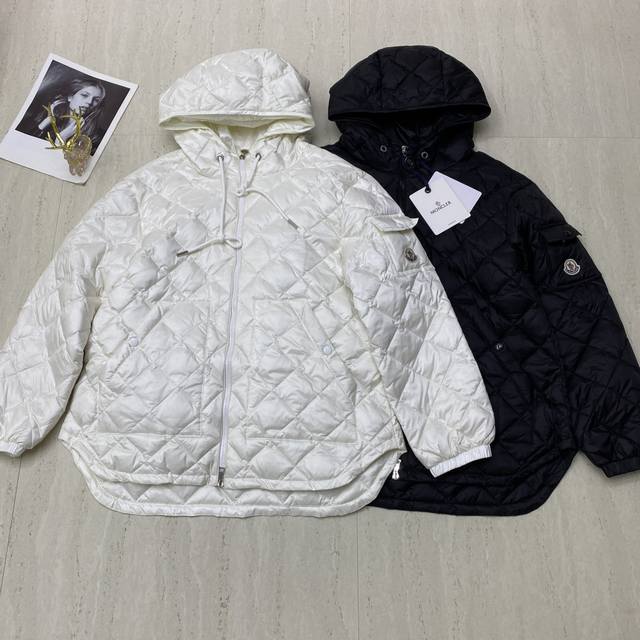New arrival . A photo of Monk's new hooded zip-up down jacket. Made of soft, d