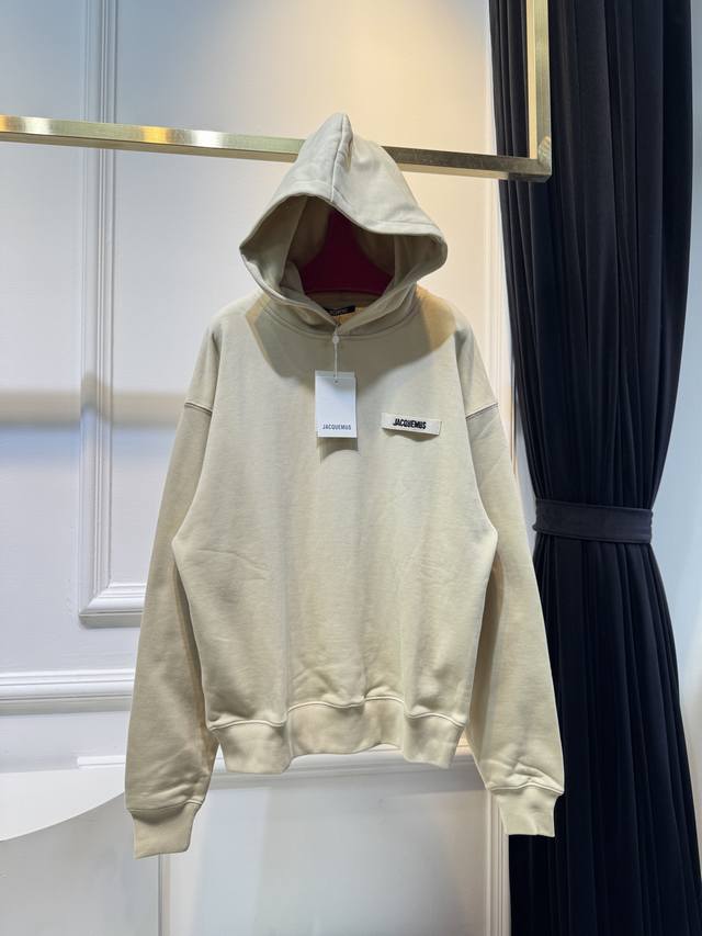 jacquemu* Hoodie This hooded sweatshirt is a cardigan style with a zipper that c