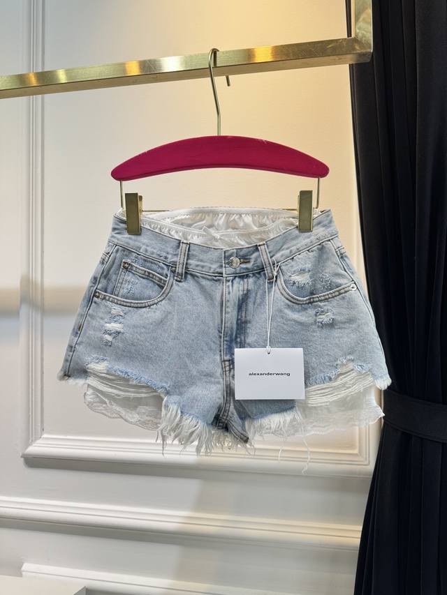 Alexander Wang's new mini shorts feature a non-detachable lace lining, a stylish