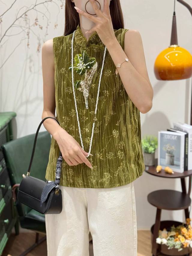 This elegant velvet vest with heavy beading and embroidery is instantly appeali