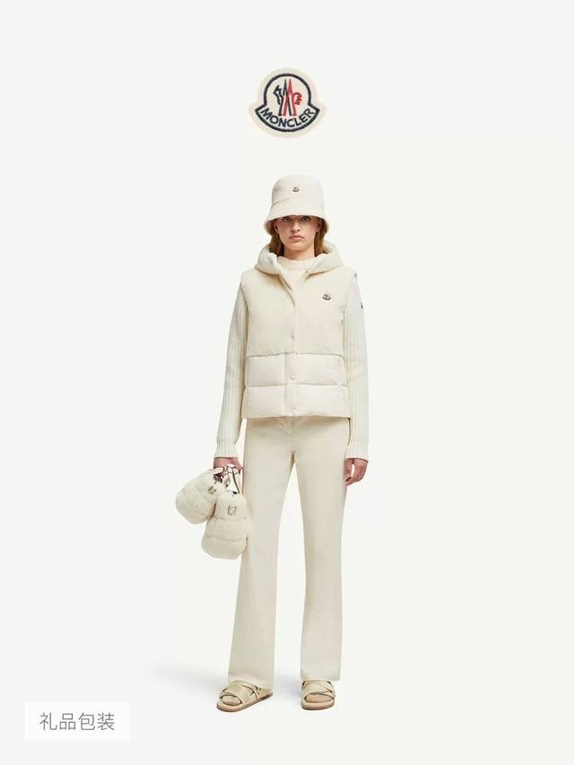 M's new early fall 25 fur patchwork hooded down vest. A stylish piece featuring