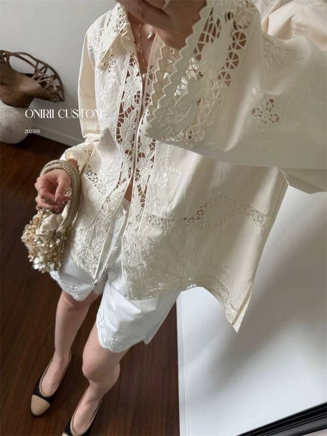 Heavy-weight, finely crafted shirt with ultra-heavy hollow embroidery. Romantic