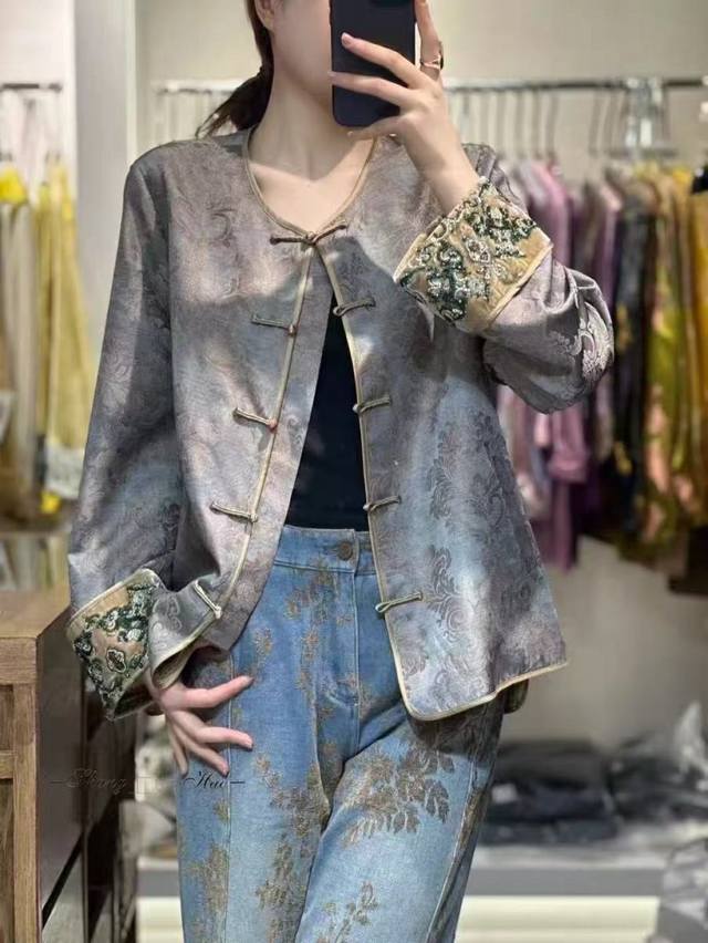 This stylish, heavily embroidered, beaded jacquard cardigan features Chinese-st