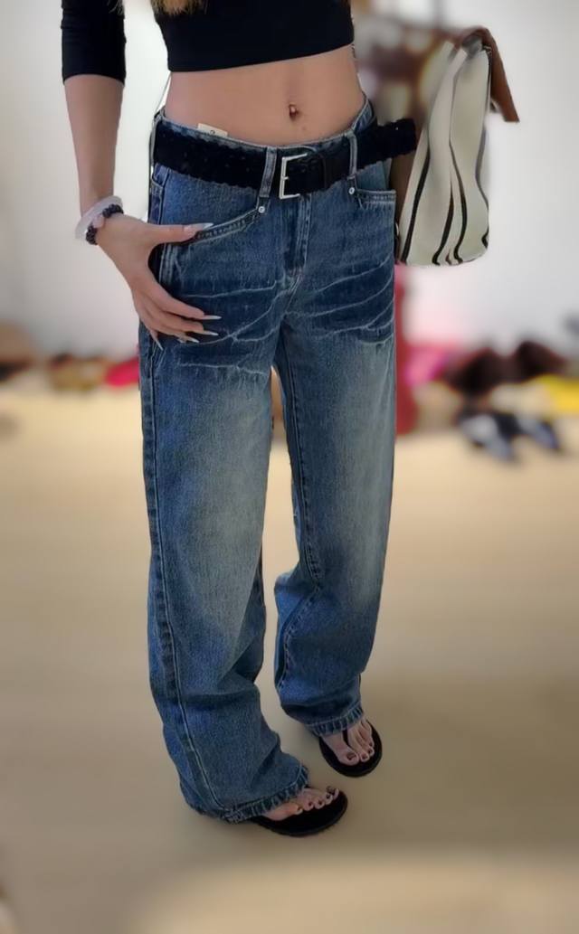 These popular wide-leg jeans feature a distressed wash process for a vintage vi