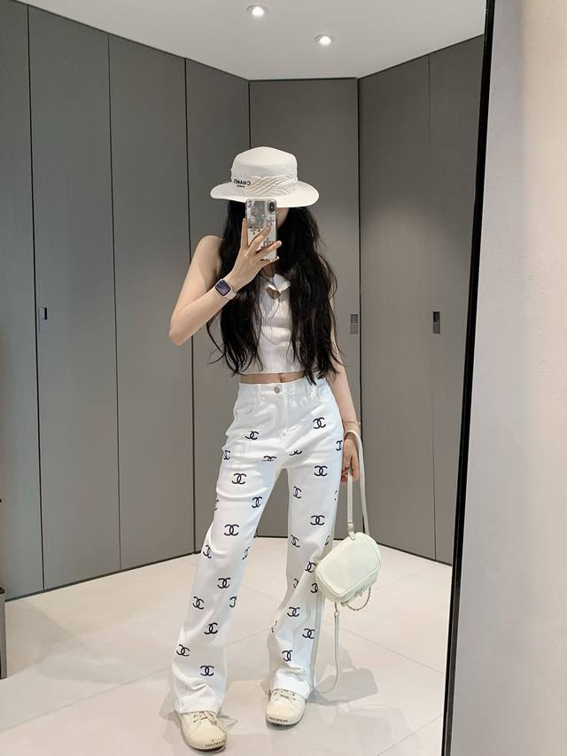 These Chanel-inspired, logo-emblazoned stretch denim pants are a classic, age-d