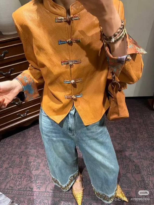 Xiangyun yarn + protein leather national trend style buttoned slimming top Colo