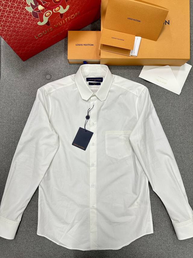 Embroidered cotton long-sleeved shirtOur shirt line products are well-known for