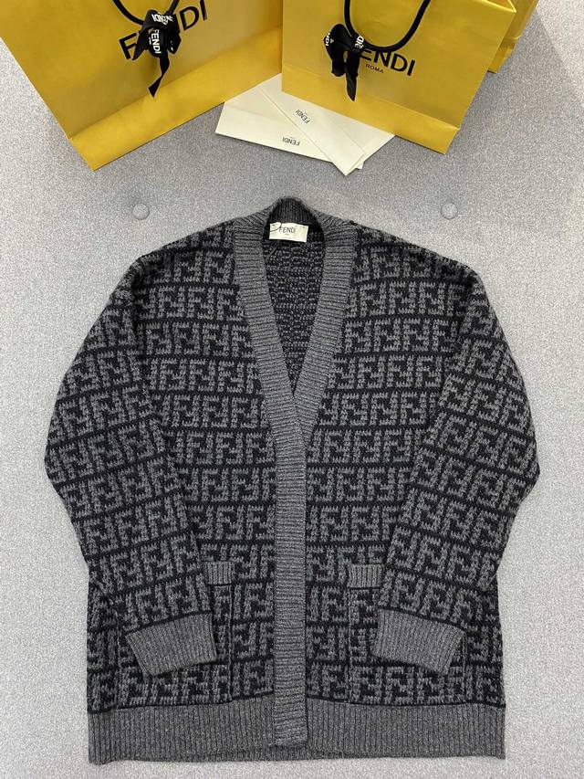 Black Ff Crochet Cashmere Cardigan is timeless and is continuously available in