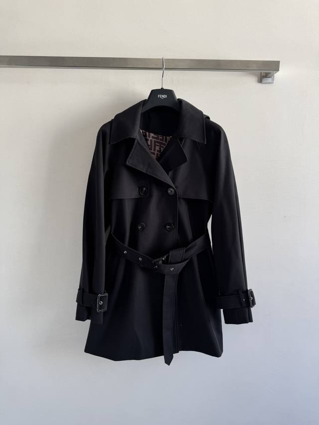 Fend* 25's new lapel belted trench coat features a detachable hood for casual or