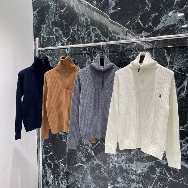 Raff 25's new early fall high-neck knitted cardigan features a classic pony emb