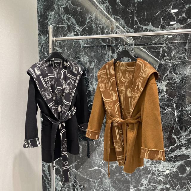 Her 25's new early fall hooded monogram knitted jacket features a rich jacquard