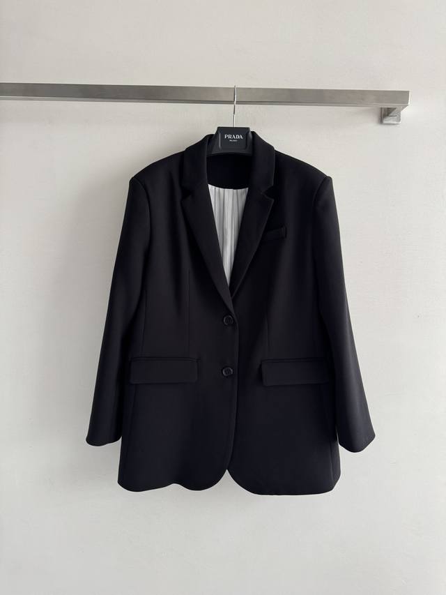 prad* 25Fw's new blazer features a vertical striped lining and brand logo embell