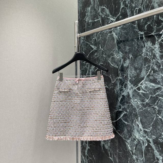 Val Warren's new 2025 early fall fringed woolen skirt with a custom YB jacquard