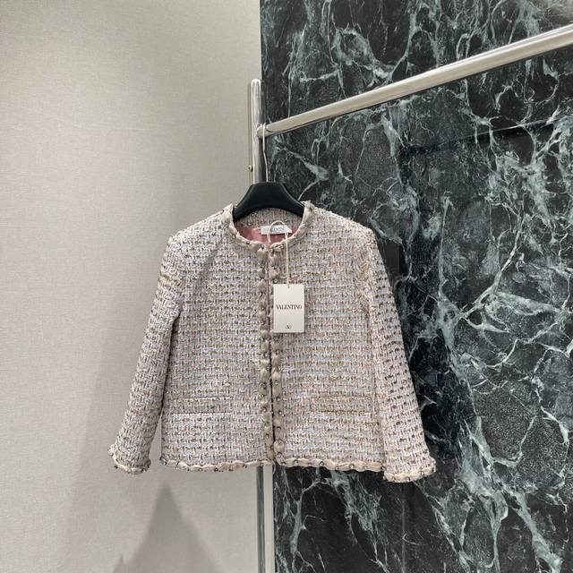 Val Warren's new early fall 2025 round-neck woolen coat with a custom YB jacquar