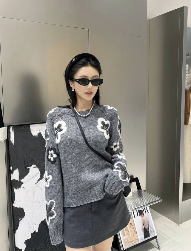 Valen's new floral knit crewneck sweater for early fall 2025. Made of comfortabl