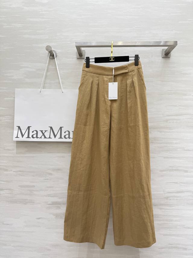 Maxmar2's new retro, old-money style linen high-waisted pleated trousers are a c