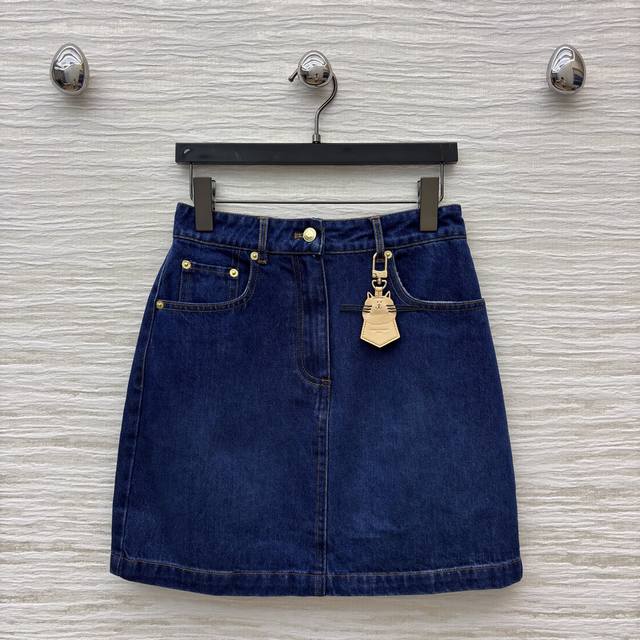 L's 25th Fall/Winter Cat Leather Denim Collection. Classic dark blue denim skirt