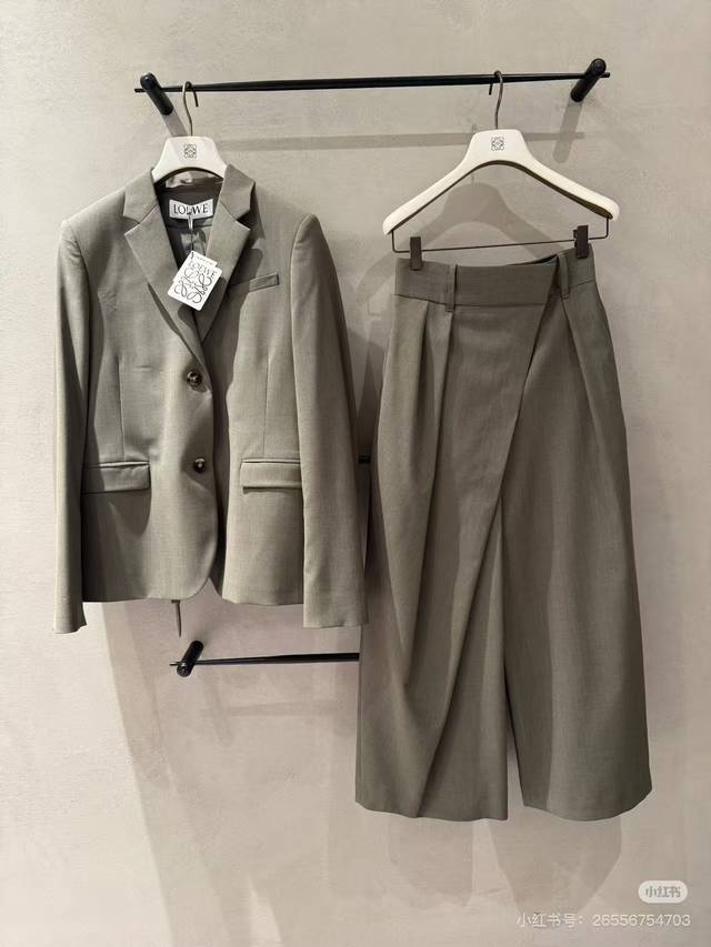 Loew* new stylish personality back slit tie design loose version two button long